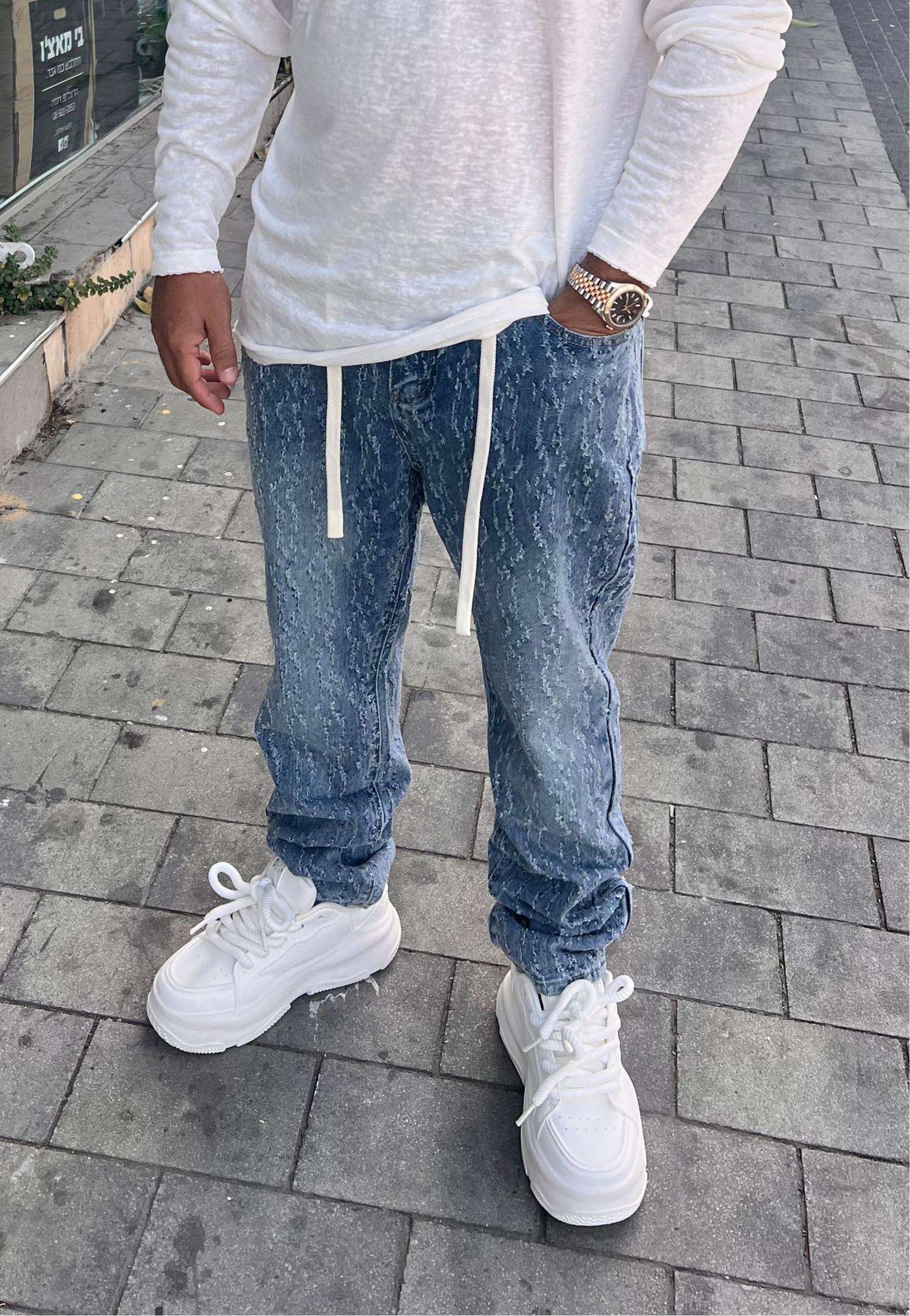 ג׳ינס אופנה קרעים זיגזג