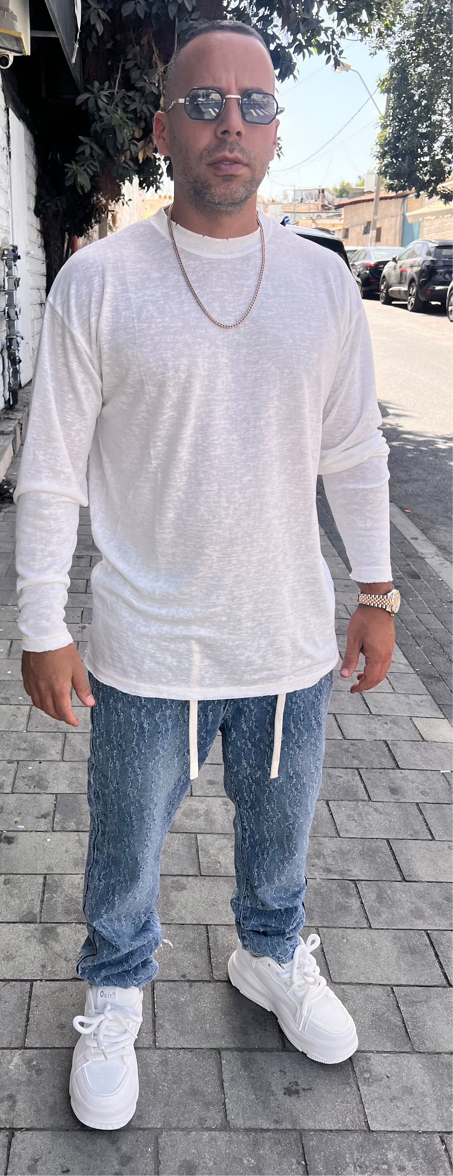 ג׳ינס אופנה קרעים זיגזג